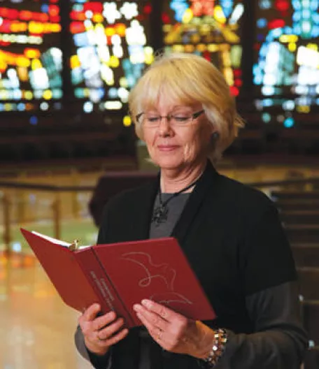 woman reading in a church